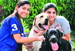 Baani Kaur with her pet dogs Brutus and Casper