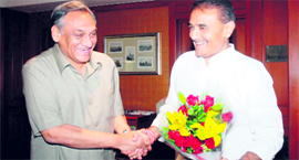 Chief Minister Vijay Bahuguna meets Union Heavy Industry and Public Enterprises Minister Praful Patel in New Delhi on Friday.
