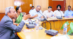 Chief Secretary Alok Kumar Jain addresses officials during a meeting in Dehradun on Friday.