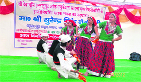 Students perform at a function to inaugurate a new block of Dev Bhoomi Institue in Dehradun on Friday.