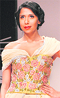 A draped saree with an embroidered top by Bhairavi Jaikishan