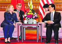 US Secretary of State Hillary Clinton (L) with China's President Hu Jintao during a meeting in Beijing on Friday