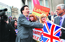 Labour Party leader Ed Miliband is congratulated by supporters in Birmingham on Friday