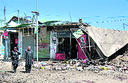 The site of a suicide bombing in Khar near the Afghan border on Friday
