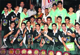 The teams of the girls and boys section of St Thomas College that won the 17th Gardner Premier League Inter-school Indoor Cricket Tournament in Dehradun on Saturday