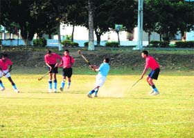 A match in progress in the RIMC inter-section hockey tournament in Dehradun on Saturday