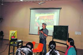 Photographer Bhumesh Bharati during a workshop organised by SPICMACAY at St Joseph's Academy in Dehradun