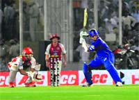 Rajasthan Royals Rahul Dravid hits a four against Kings XI Punjab at PCA Stadium in Mohali on Saturday