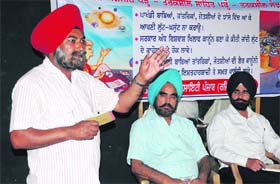 A speaker addresses a seminar organised by the Taraksheel Society in Amritsar on Sunday