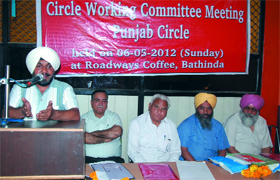 A speaker (above) addressing a meeting of the All India Postal Employees Union Group 'C', Punjab Circle, in Bathinda on Sunday