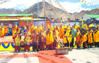 Buddhist monks pray during a function held on Buddha Purnima in Leh town