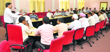 Sarpanches of Jammu province attend a conference in Jammu on Sunday.