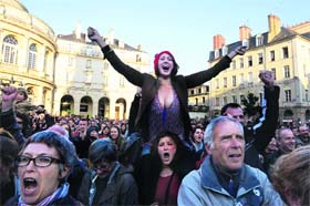 Supporters of Francois Hollande, Frances newly elected President, celebrate in Rennes, western France, after the announcement of the results of the presidential polls