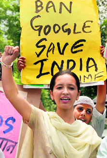In this June 2007 file photo, activists hold a protest rally against Google and Orkut websites in New Delhi. India has opened an anti-trust investigation into Google's online advertising practices, suspecting them of being anti-competitive.