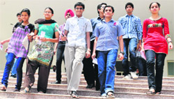 Students come out after appearing in the AIEEE at the Chandigarh Group of Colleges, Gharuan