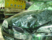  The damaged car in the Tilak Marg area, New Delhi, on Monday. 