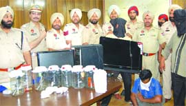 The accused in police custody in Jalandhar on Monday. 