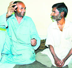 Mohammed Ahmed and Musharaf Hussain, who have been Red Cross Societys guests after their release from Pakistan jails, live an unknown but peaceful life here in Amritsar. 