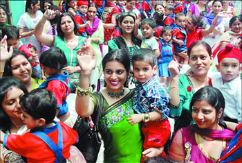 Mothers of tiny tots having a great time during a function organised to mark the Mothers Day celebrations at the Bachpan play school in Bathinda 