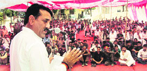 MLC Jugal Kishore Sharma addresses a gathering in his home town Maitra in Ramban on Tuesday. 