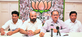 Nirmal Singh, BJP national executive member, addresses mediapersons at the party headquarters in Jammu on Tuesday. 