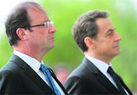 Frances President-elect Francois Hollande and outgoing President Nicolas Sarkozy during a ceremony marking the 67th anniversary of the Allied victory over Nazi Germany in World War II, in Paris on Tuesday. 