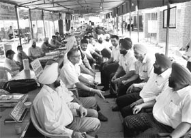 Advocates observe a strike at the district courts in Mohali on Wednesday