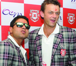 Adam Gilchrist (right) and Piyush Chawla, members of the Kings XI Punjab team of the IPL, during a promotional event at Chandni Chowk