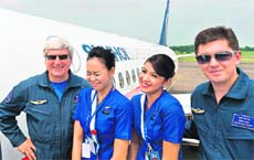 Russian test pilot Alexander Yablontsev with crew before take-off, at Jakarta airport.