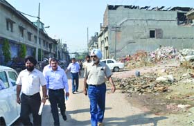 Inquiry committee head Lt Gen BS Dhaliwal visits the Shital Fibres building collapse site in Jalandhar on Wednesday