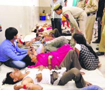 Injured passengers being treated at a hospital in Katra on Wednesday.