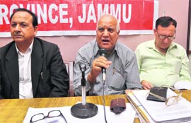 A member of the Municipal & Urban Local Bodies Pensioners Association addresses mediapersons in Jammu on Wednesday.
