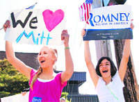 Supporters of Republican presidential candidate Mitt Romney cheer in Michigan.
