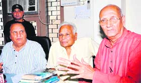 Padmashree awardees Leela Dhar Jaguri (right) and Dheerendra Sharma and Avdesh Kaushal of the Uttarakhand Jan Manch address mediapersons in Haridwar on Thursday