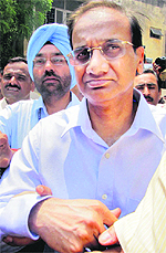 Former Principal Secretary, Health, Pradeep Shukla after being detained by the CBI in Lucknow on Thursday