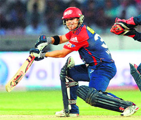 <p>Delhi Daredevils David Warner plays a shot during their match against Deccan Chargers at Rajiv Gandhi International Stadium in Hyderabad on Thursday. Daredevils won by 9 wickets. 