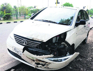 A car that met with an accident near the non-functional Sector 47-48 lights in Chandigarh on Friday.