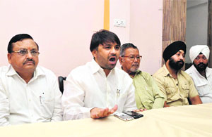 President of the Uttarakhand Krantikari Morcha Kunwar Jupinderjit (second from left) addresses a press conference in Dehradun on Friday. 