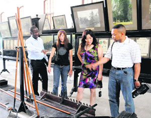 Visitors from abroad look at the exhibits at Forest Research Institute in Dehradun. 