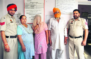 The couple caught in a human trafficking case in police custody in Ludhiana on Friday.
