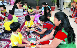 Students participate at a workshop in Indus World School in Ludhiana on Friday.