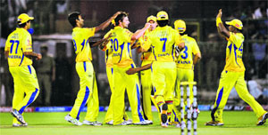 Chennai Super Kings players celebrate the wicket of Rajasthan Royals Rahul Dravid during their match at Swai Man Singh stadium in Jaipur on Thursday. Chennai won by four wickets.