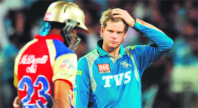 Pune Warriors captain Steve Smith reacts during their match against Royal Challengers Bangalore at the Subrata Roy Sahara Stadium in Pune on Friday. RCB won the match by 35 runs. 