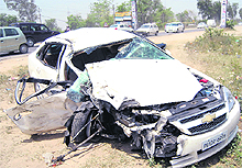 The mangled remains of the car that collided head-on with a truck on the Jalandhar-Amrtisar highway on Saturday in Kartarpur