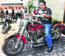 Anoop Prakash, Managing Director of Harley-Davidson India, poses for a photograph during the opening of a Harley-Davidson showroom in Kolkata on Sunday