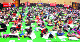 Participants give final touches to their artistic creations during an on-the-spot painting competition organised by The Tribune Group of Publications in Chandigarh on Sunday.