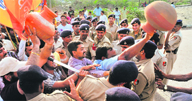 Residents of Hallo Majra and BJP workers protest against erratic potable water supply in Chandigarh on Sunday.
