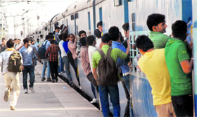 Aspirants who appeared for the railway board exam return home, at Chandigarh on Sunday.