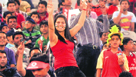 A fan rejoices during the IPL match between the Kings XI Punjab and the Deccan Chargers at the PCA Stadium in Mohali on Sunday.