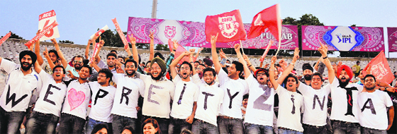 Students of the Bathinda medical college enjoy the IPL match between Deccan Chargers and Kings XI Punjab at the PCA stadium in Mohali on Sunday.
